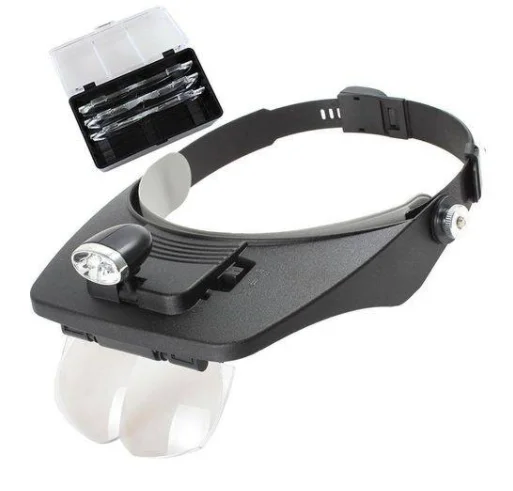 foto de lupa com suporte para cabeça com LED e 4 lentes, fundo branco
